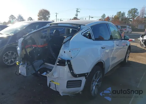 2023 Tesla Model Y Awd/Long Range Dual Motor All-Wheel Drive z USA, uszkodzony, nr VIN 7SAYGDEE7PA035771